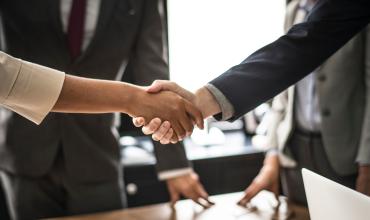 two business people shaking hands