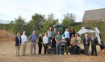 People breaking ground on the project