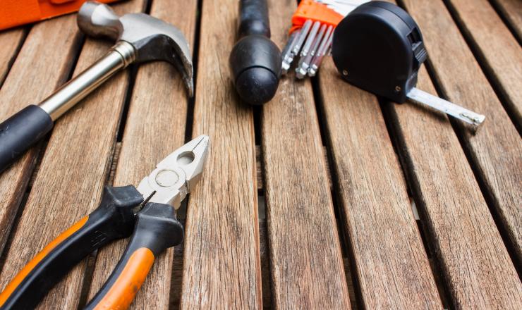 Tools laying on a wood deck