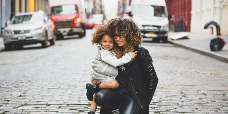How to Find the Right Lender A woman and child hugging